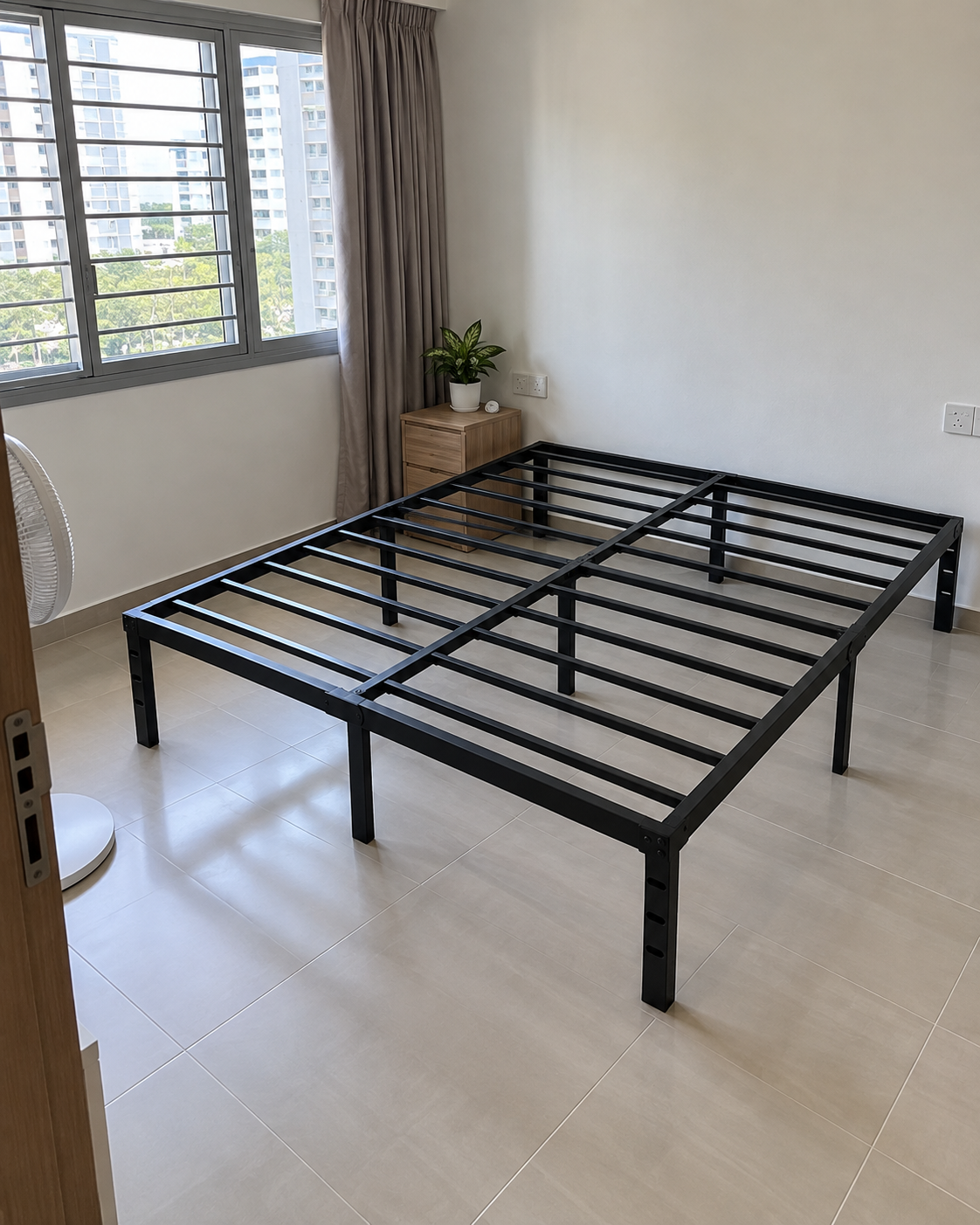 Basic Bed Frame assembled in a bright Singapore bedroom
